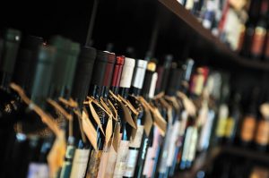 program-management-revenue-wine-bottles
